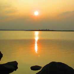 Scenic view of sunset over sea