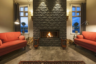 Fireplace at lounge at luxury hotel in iceland