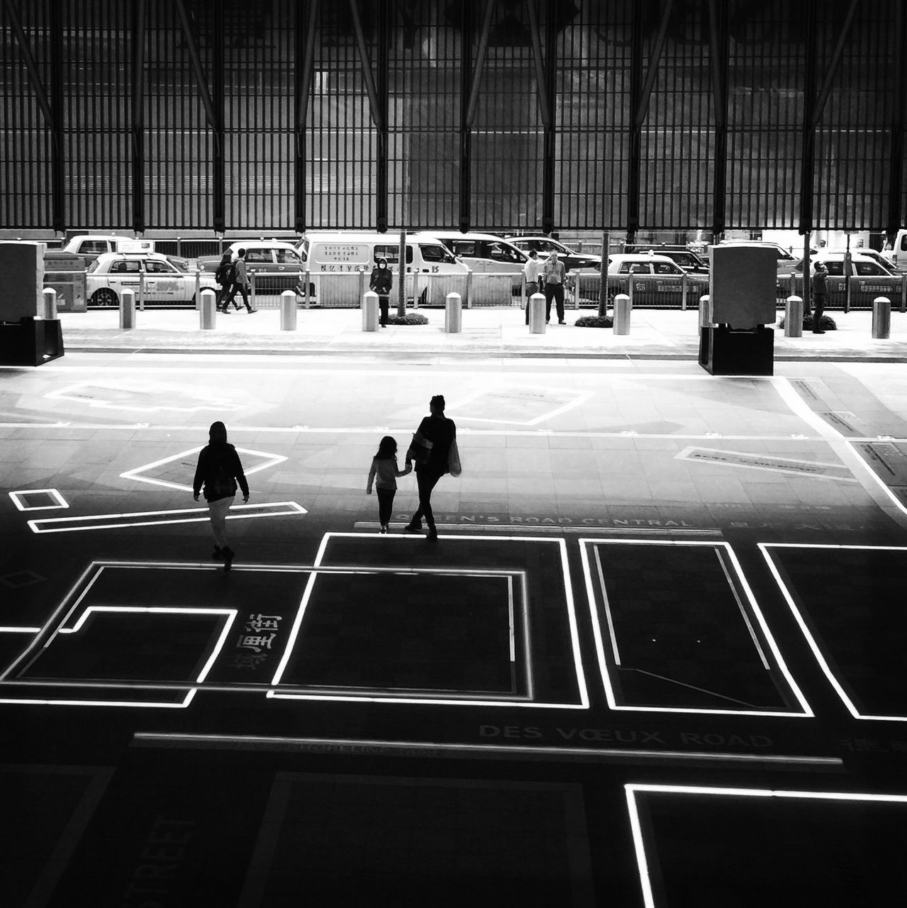 transportation, walking, men, city life, city, person, architecture, public transportation, mode of transport, railroad station, indoors, built structure, airport, glass - material, railroad station platform, lifestyles, travel, on the move, modern