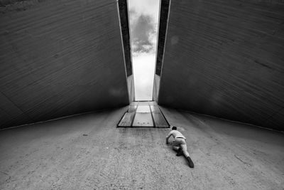 High angle view of man crawling on street