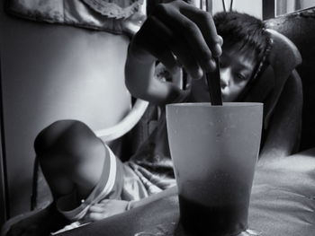 Portrait of woman drinking glass