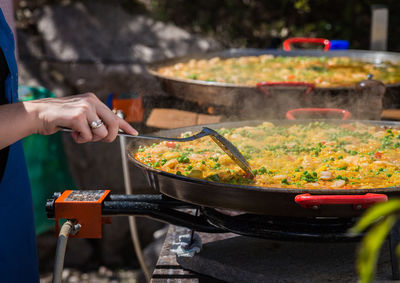 Close-up of person preparing food