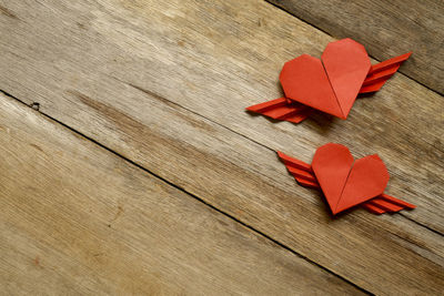 High angle view of red heart shape decoration on table