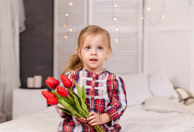 Portrait of cute girl at home