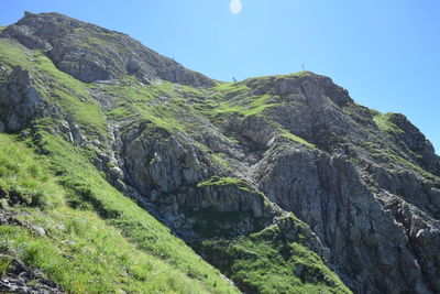 Scenic view of rocky mountains against clear sky