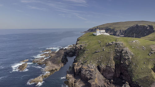 An aerial view of stoer head lighthouse in the scottish highlands, uk