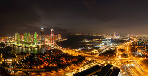 High angle view of illuminated city at night