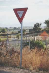Close-up of red wall against sky