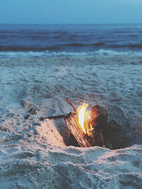 View of bonfire on beach