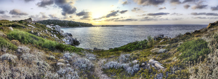 Scenic view of sea against sky during sunset