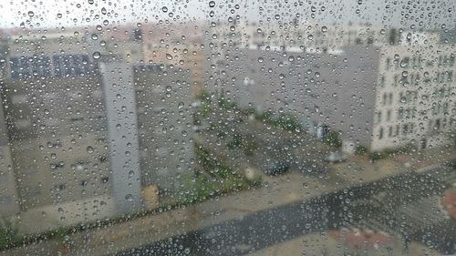 Close-up of water drops on glass window