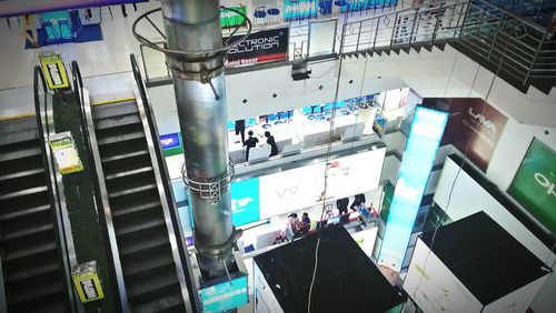 High angle view of people on escalator