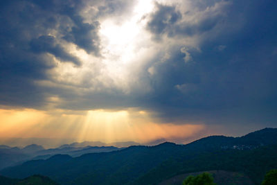 Scenic view of mountains against sky during sunset