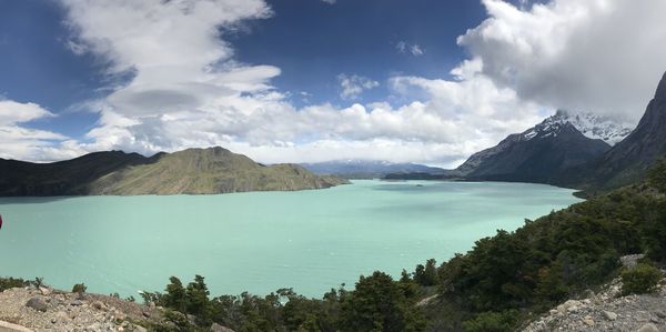 Panoramic view of lake and mountains against sky