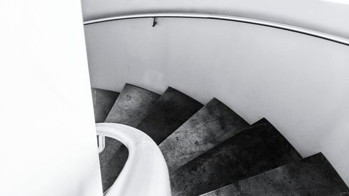 Low angle view of spiral staircase in building