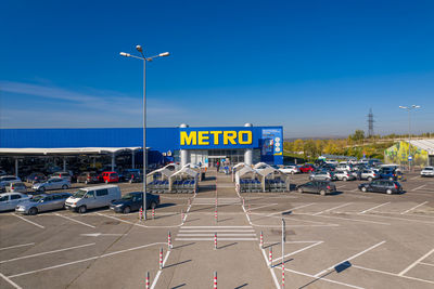 Vehicles on road against the sky