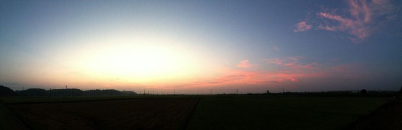 Scenic view of landscape at sunset