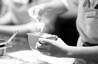 Close-up of woman holding drink