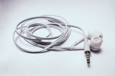 Close-up of spoon against white background