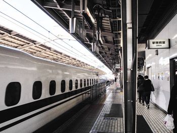 Train at railroad station in city