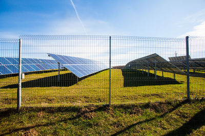 Built structure on field against sky