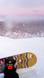 Scenic view of snow covered mountain against sky