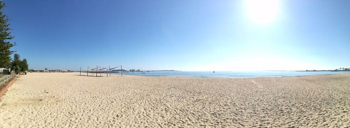 Scenic view of beach against clear sky