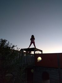 Low angle view of stairs against clear sky