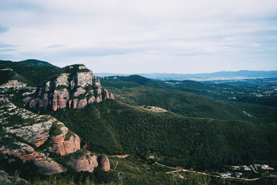 Scenic view of rocky mountains against sky