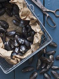 Sea mussels in metal basket