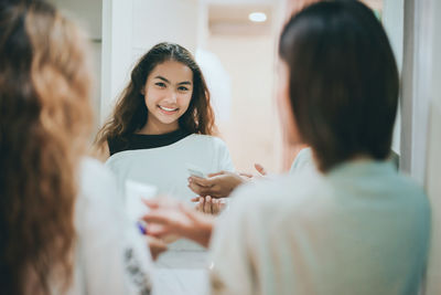 Portrait of a smiling young woman