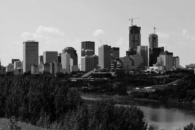 Buildings in city against sky