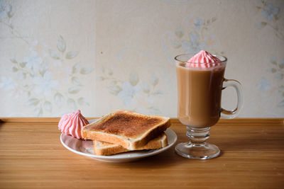 Cup of coffee on table