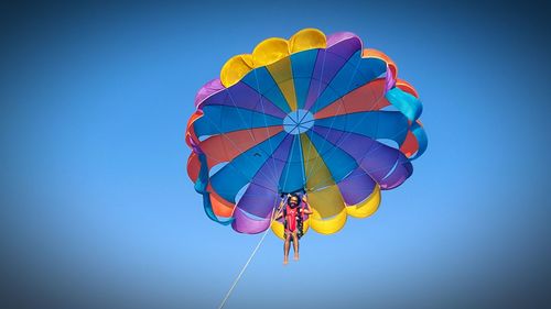 Low angle view of colorful balloons