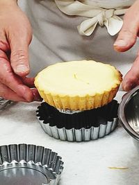 Midsection of man preparing food