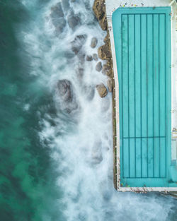 View of sea through window