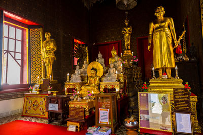 Statue in temple outside building