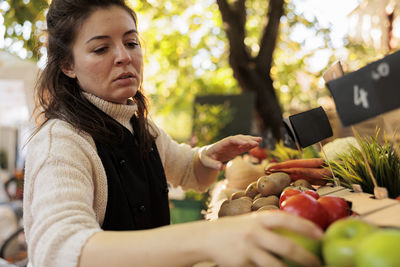 Portrait of woman using mobile phone