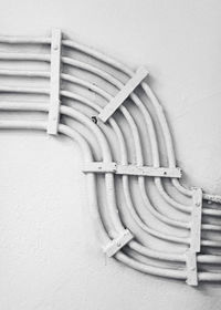 Directly above shot of piano on table against wall