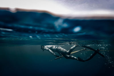 Man swimming in sea