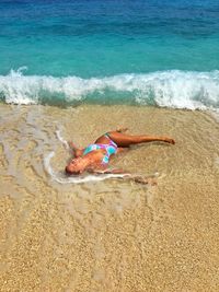 Full length of boy on beach