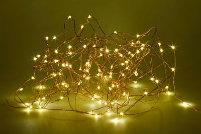 Close-up of illuminated string lights on table