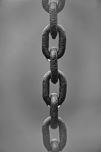 Close-up of chain against blurred background