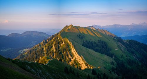 Scenic view of mountains against sky during sunset