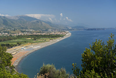 High angle view of road by sea against sky