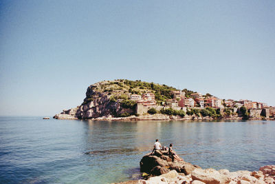 Scenic view of sea against clear sky