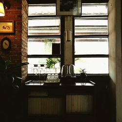 Potted plant on window sill of building