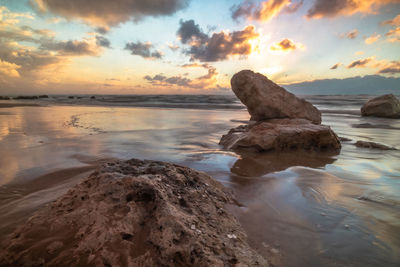 Scenic view of sea against sky during sunset