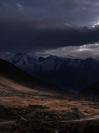 Scenic view of mountains against sky during dusk