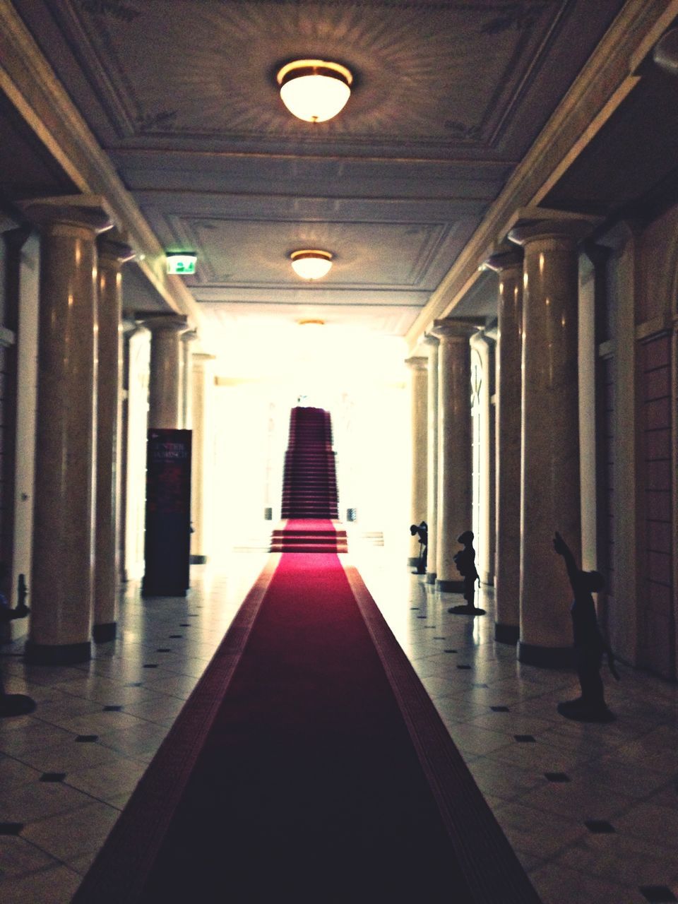 the way forward, architecture, indoors, built structure, corridor, ceiling, diminishing perspective, illuminated, lighting equipment, vanishing point, empty, in a row, architectural column, long, narrow, column, absence, building, no people, flooring